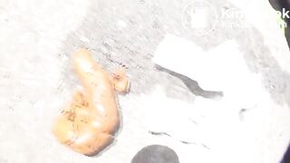 Asian girl pooping in public parking lot