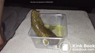 Girl shitting big turd into a plastic container