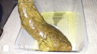 Girl shitting big turd into a plastic container