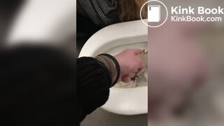 Licking a shit filled toilet