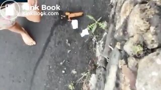 Girls shit in the side of the road