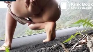 Girls shit in the side of the road