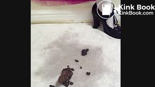 Girl shitting very big hard turd on the floor