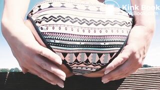 Taking a dump over her neighbor's fence