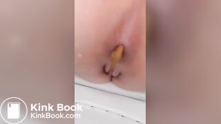 Girl emptying on the toilet