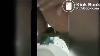 Queen pooping on toilet.