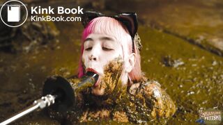 Catwoman Lyndra in cowshit