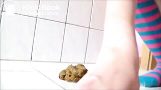 Scat - Skinny teen with long socks shitting on the floo