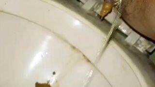 Asian woman having a shit - video 2