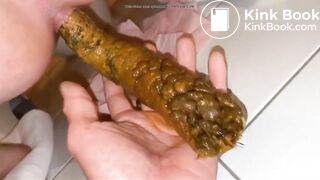 She is poooing in her bf hand