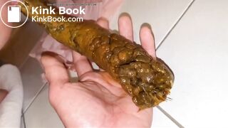 She is poooing in her bf hand