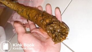 She is poooing in her bf hand