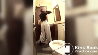 Long haired Japanese girl drops a load in toilet - video 2