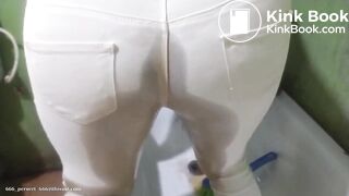 African shitting and pissing her white pants