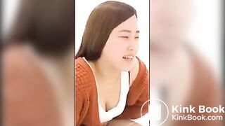 Girl pushing on toilet