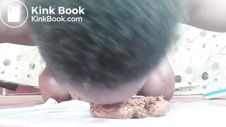 African shitting and filling her face with shit