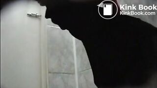 Woman in a coat spied taking an explosive shit