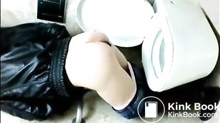 Brunette poops in public toilet