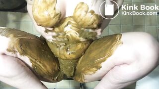 Busty blonde slut smears her body with shit