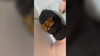 Girl tries to feed a large amount of poop to slave