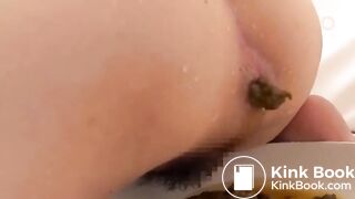 two guys fuck her next to her shit