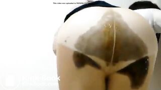 Locked out asian girl desperately messes into her pants