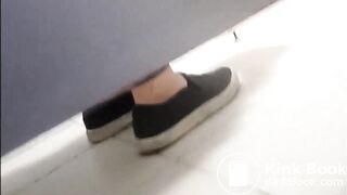 Woman Pooping in a Stall