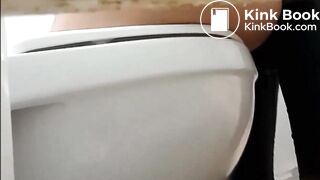 Woman Pooping in a Stall