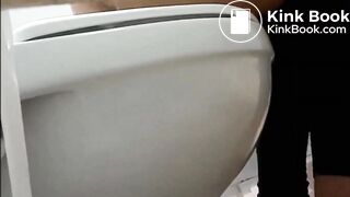 Woman Pooping in a Stall