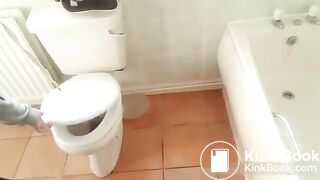 Lovely woman inaugurating her new toilet