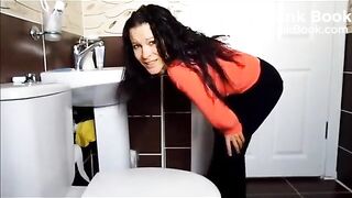Shitting on top of the toilet seat