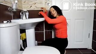 Shitting on top of the toilet seat