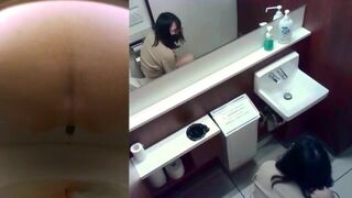 Japanese girl shitting on toilet