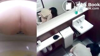 Japanese girl shitting on toilet