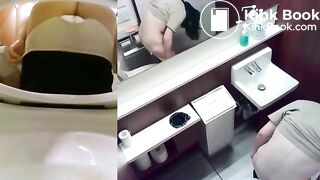 Japanese girl shitting on toilet