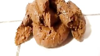 skinny girl does a perfect soft serve shit