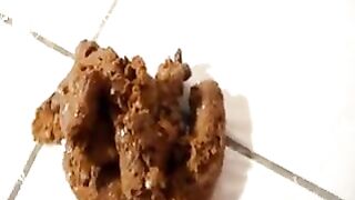 skinny girl does a perfect soft serve shit