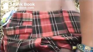 Young girl shitting outdoor