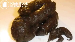 On her side shitting on a countertop