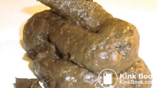 On her side shitting on a countertop