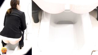 Young Woman in a Suit Pooping