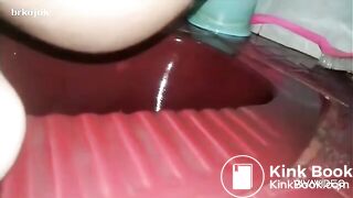 Asian girl pooping in toilet - video 2