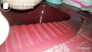 Asian girl pooping in toilet - video 2