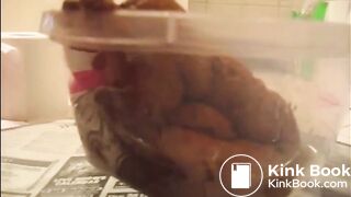 Soft poop in container - video 2