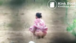 desi aunty takes a dump in the open