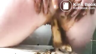 Girl with awesome saggy tits plays with her poop