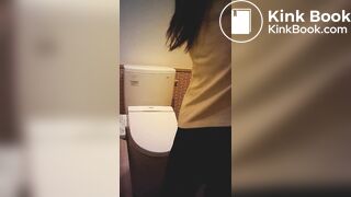 Asian woman taking a shit in restroom - video 2