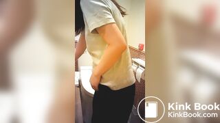 Asian woman taking a shit in restroom - video 2