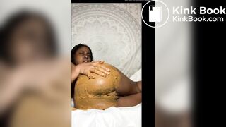 Smearing her ass with shit and tasting it