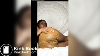 Smearing her ass with shit and tasting it